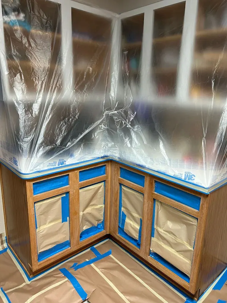 Cabinets masked for finishing work