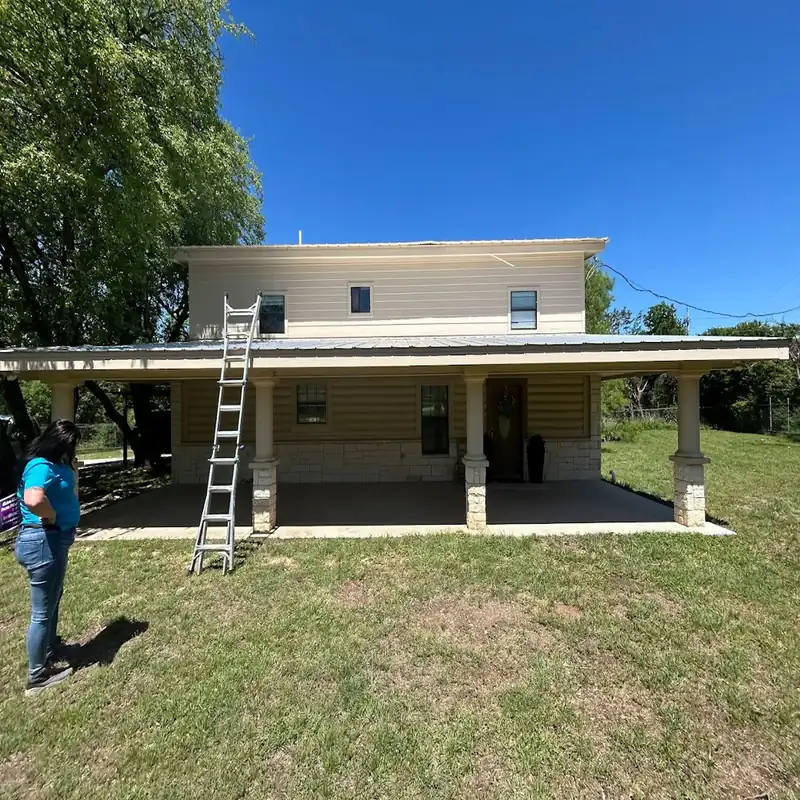 Rear exterior with a covered patio