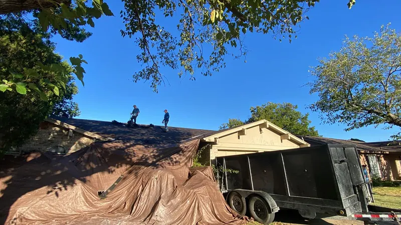Roof work area with protective coverings