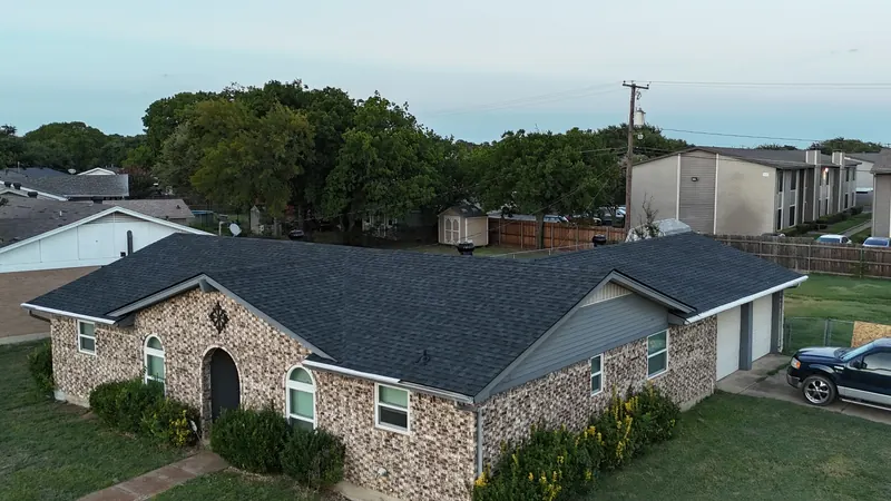 Aerial view of a dark shingle roof